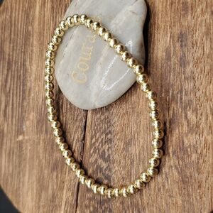 Gold covered bronze mini bullet beaded bracelet B3213